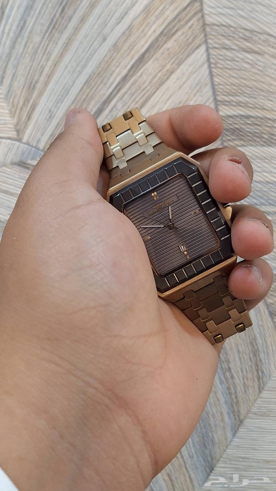 ساعه ستيل لون ذهبي63085146134915111