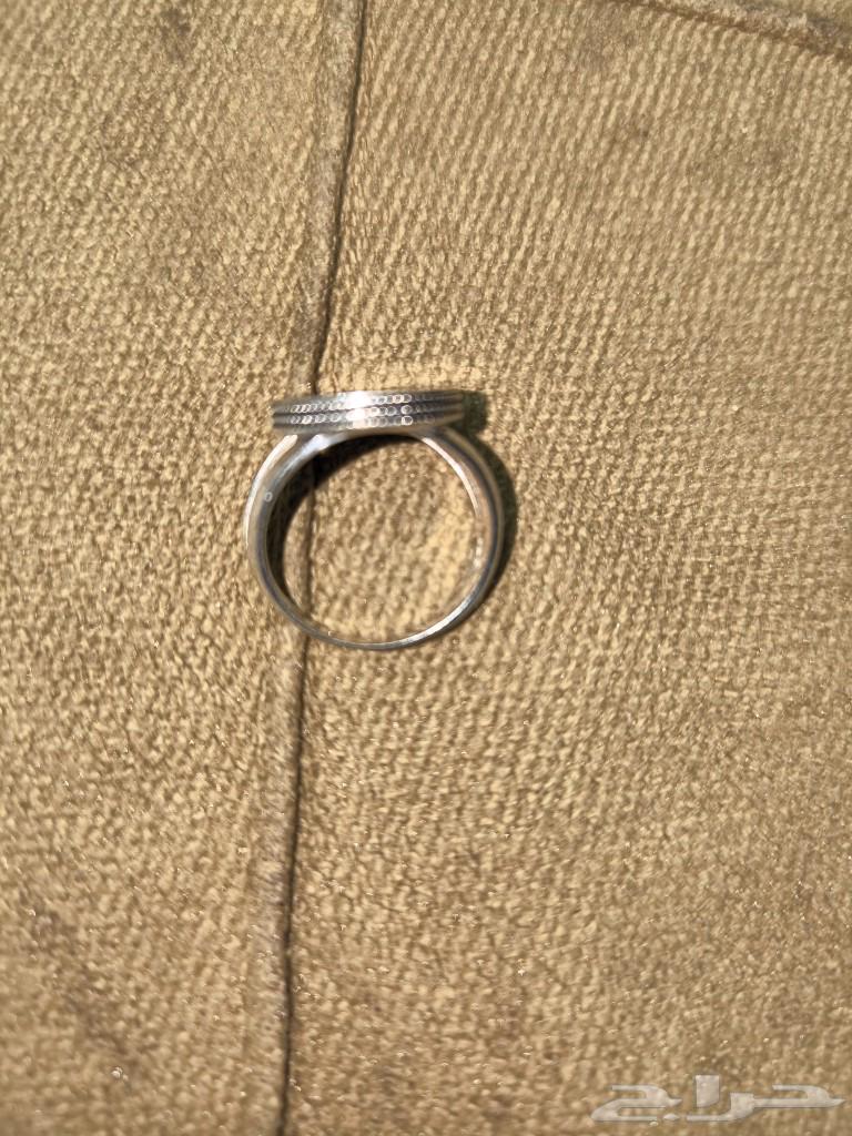 Silver ring with original precious stone63074156026755111