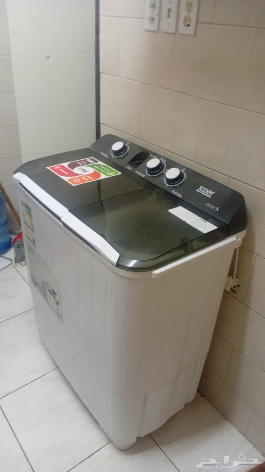 Malaysian bedroom, living room, refrigerator, washing machine, oven, and two window air conditioners630745799407371128