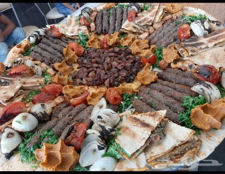 Outdoor barbecue chef in Riyadh, preparing outdoor slaughter63016091565569114