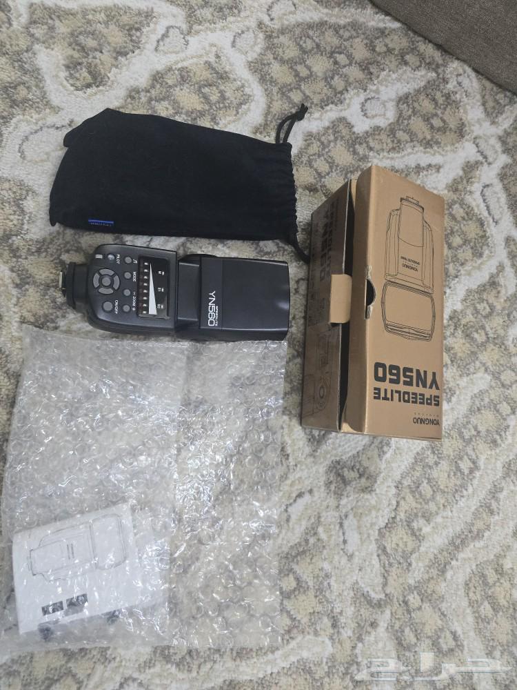 For sale, a complete camera flash with its accessories63069670270593111