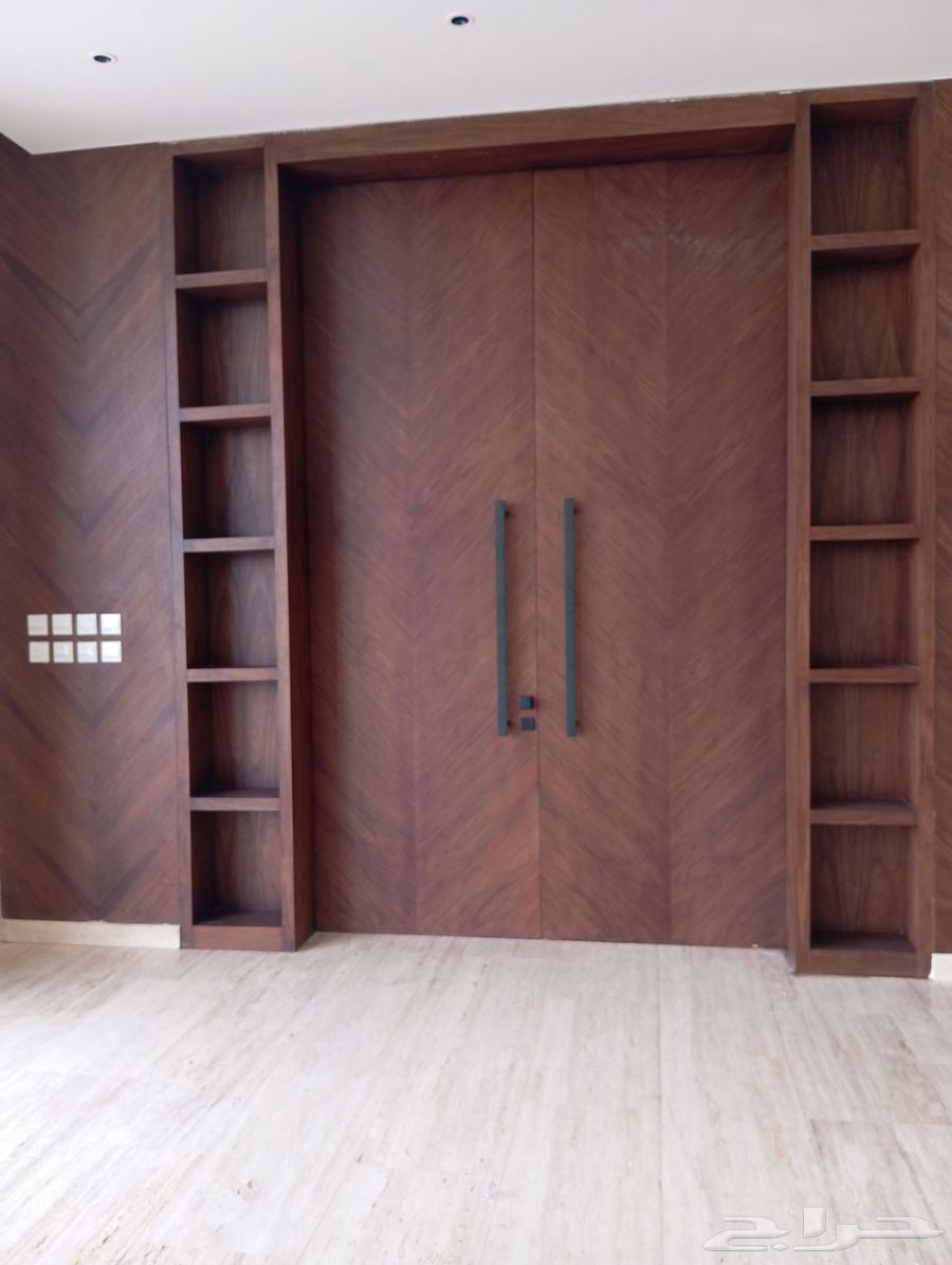 A wooden door made of walnut bark with paint and installation without handle and keyhole63065597365123113
