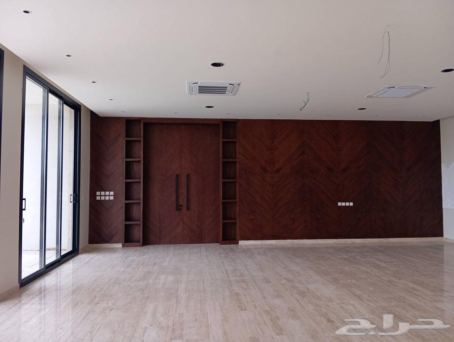 A wooden door made of walnut bark with paint and installation without handle and keyhole63065597365123114