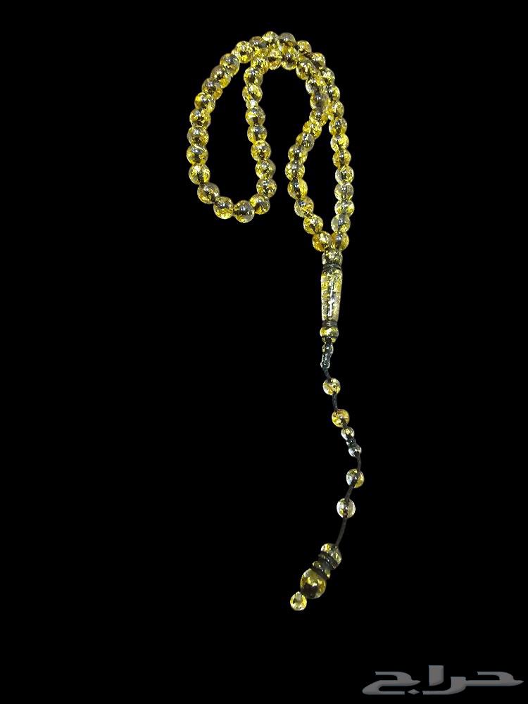 Luxurious swimming with cola light in gold water in an elegant velvet box63064047860739112