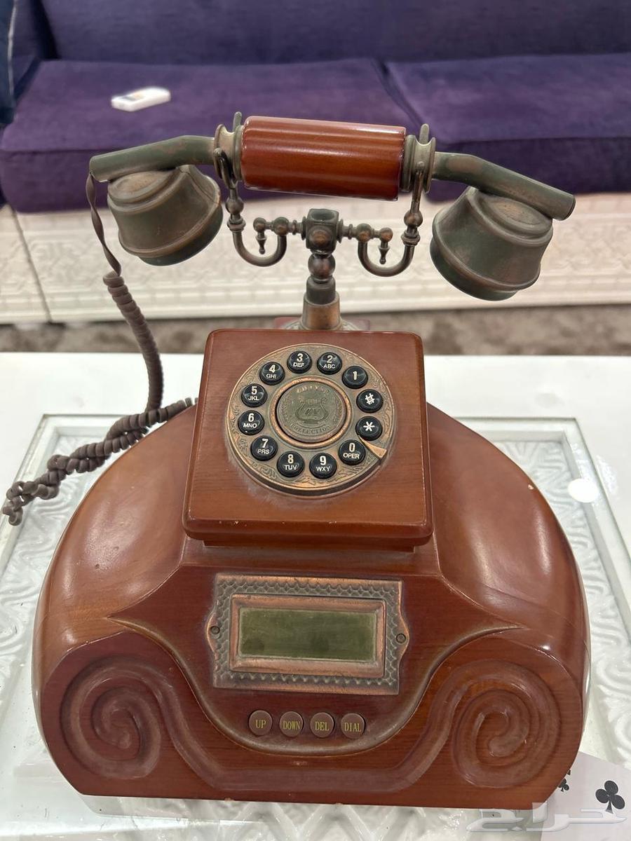 Car for sale, carries two drums 2000 in good condition and an old vintage phone 1000630965684526091126
