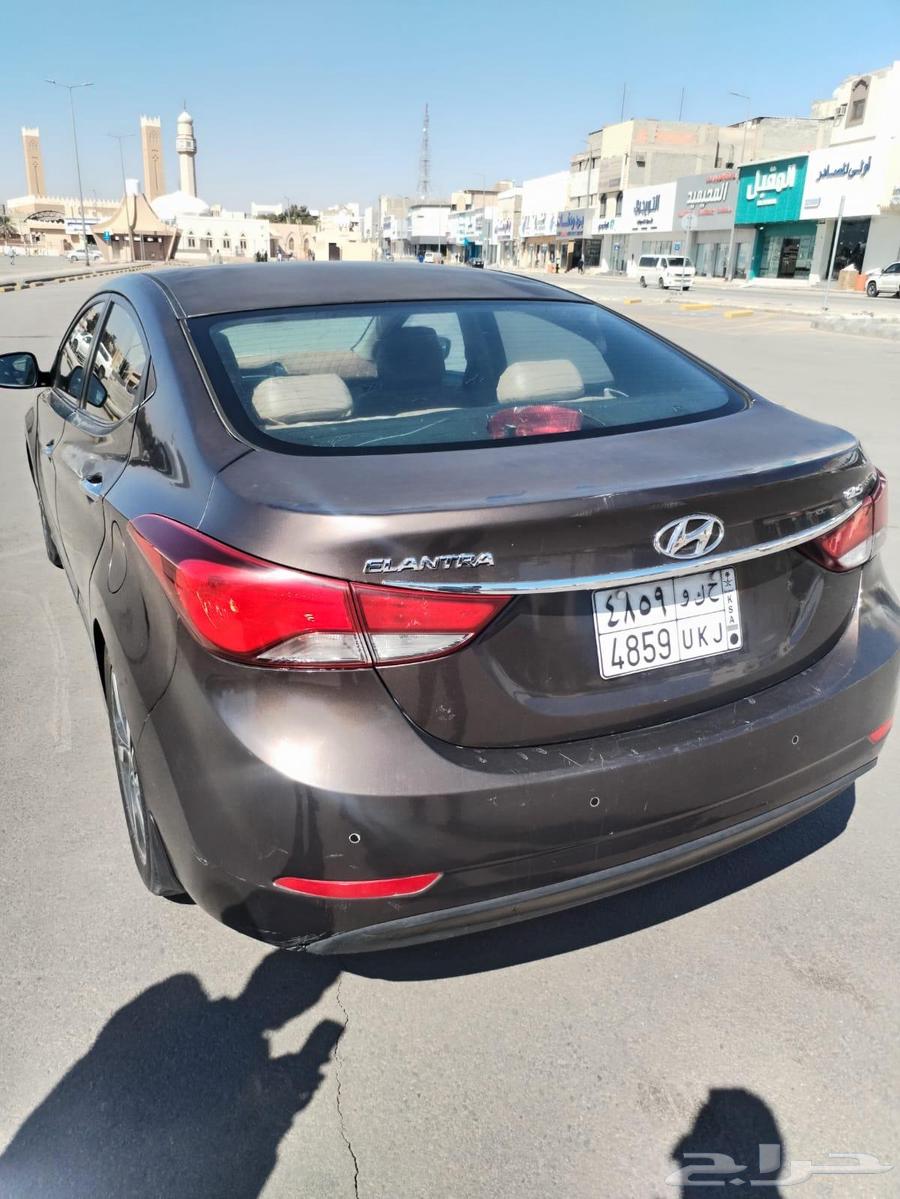 Elantra 2015 used, brown color, distinctive interior beige color63048781092097113