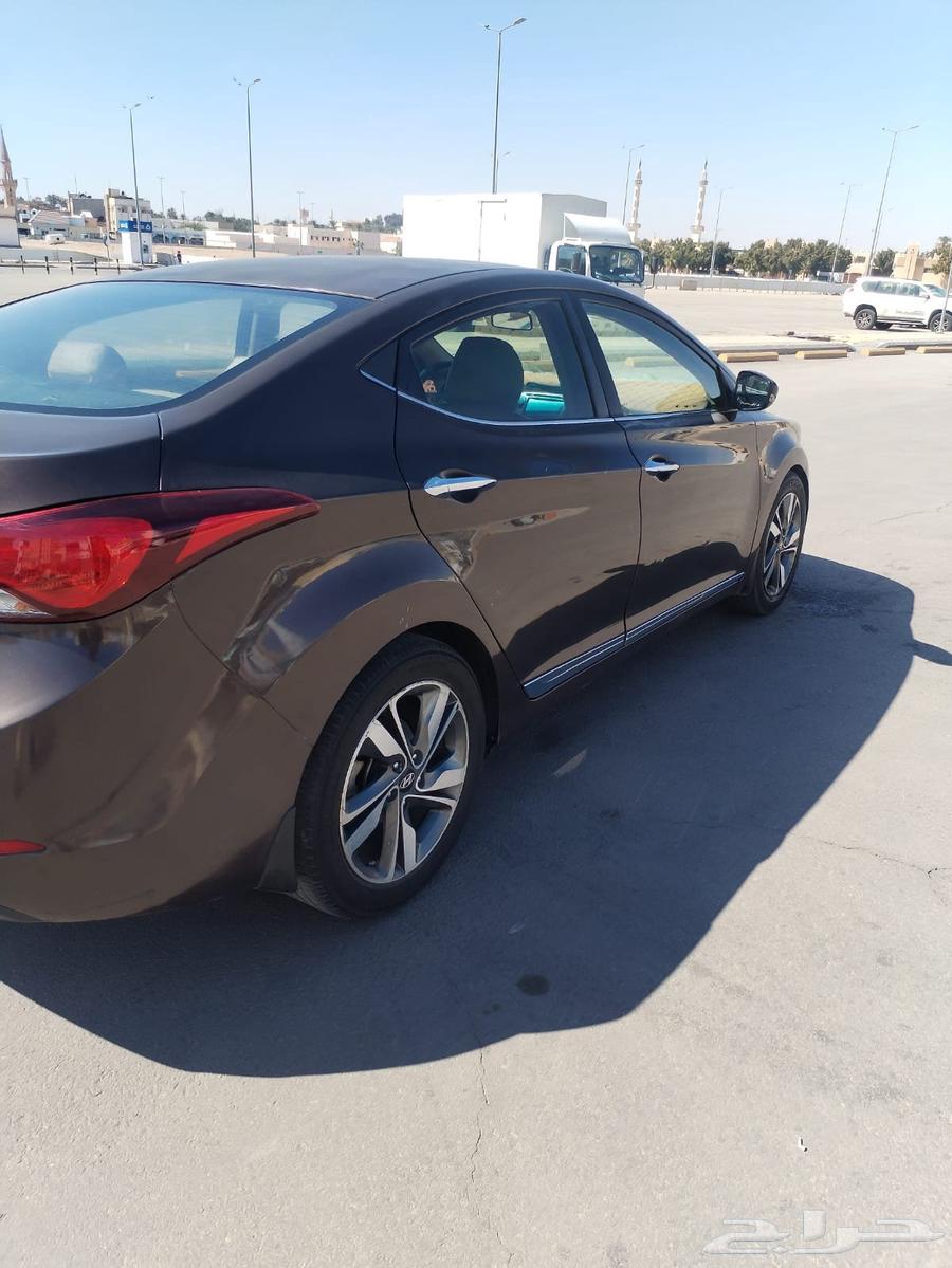 Elantra 2015 used, brown color, distinctive interior beige color63048781092097111