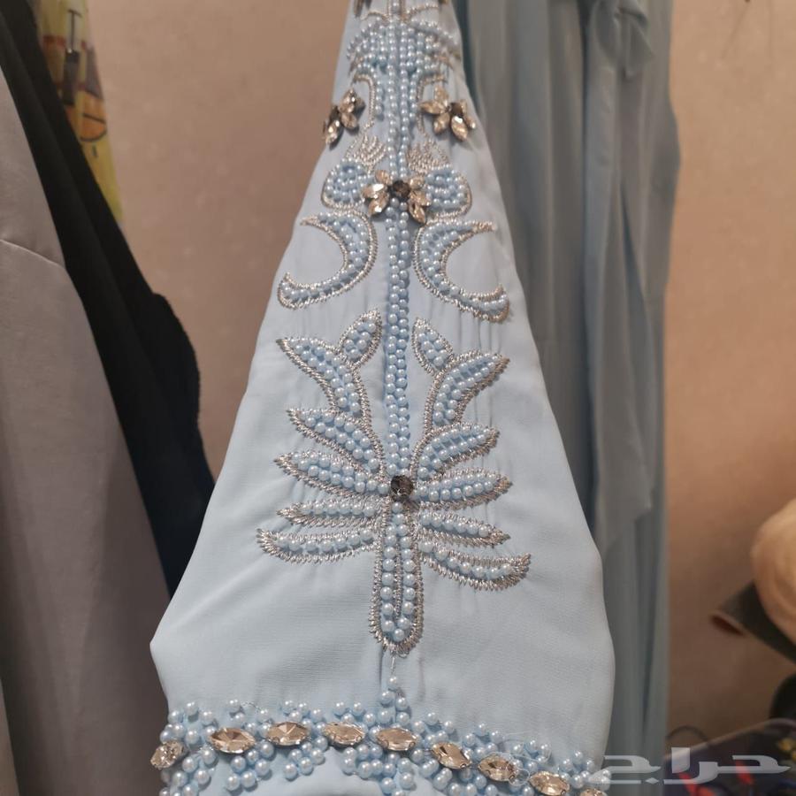 A new sky-blue dress that has not been worn63170615729409114