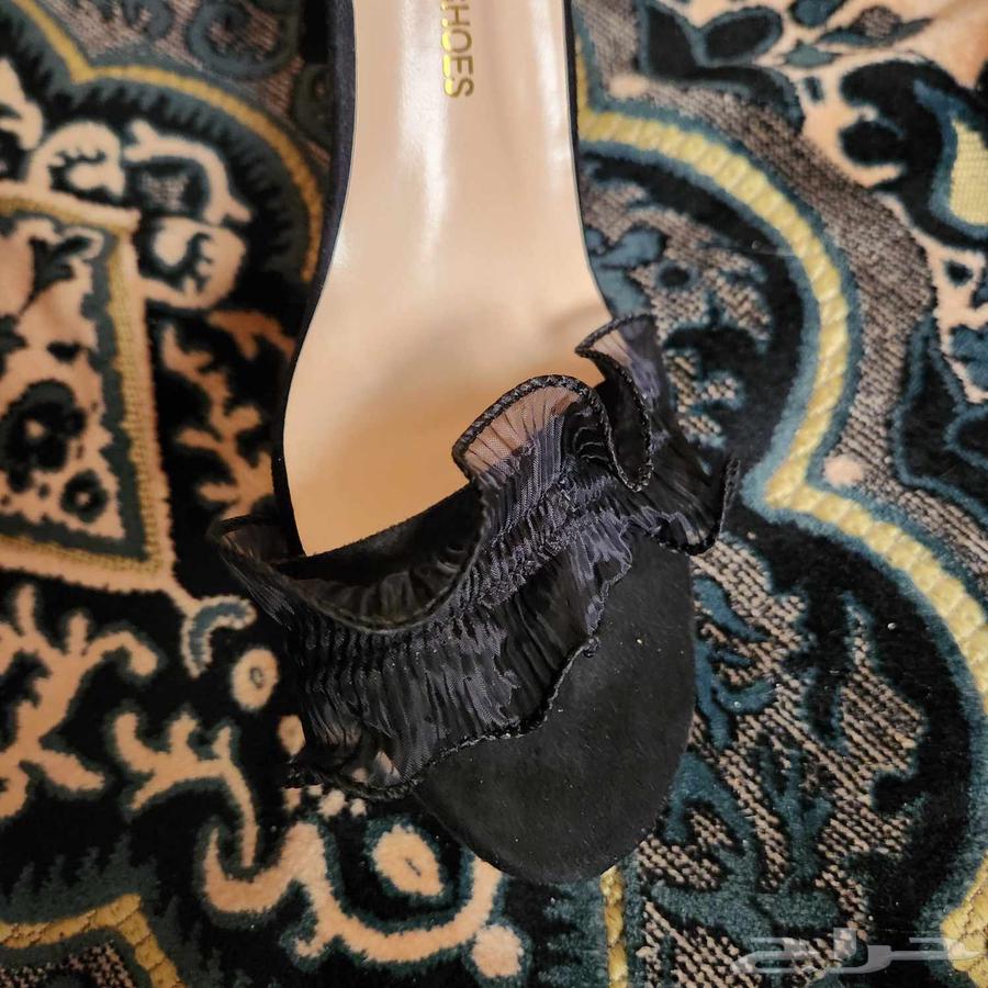 Black and beige heel size 4063421792727682114