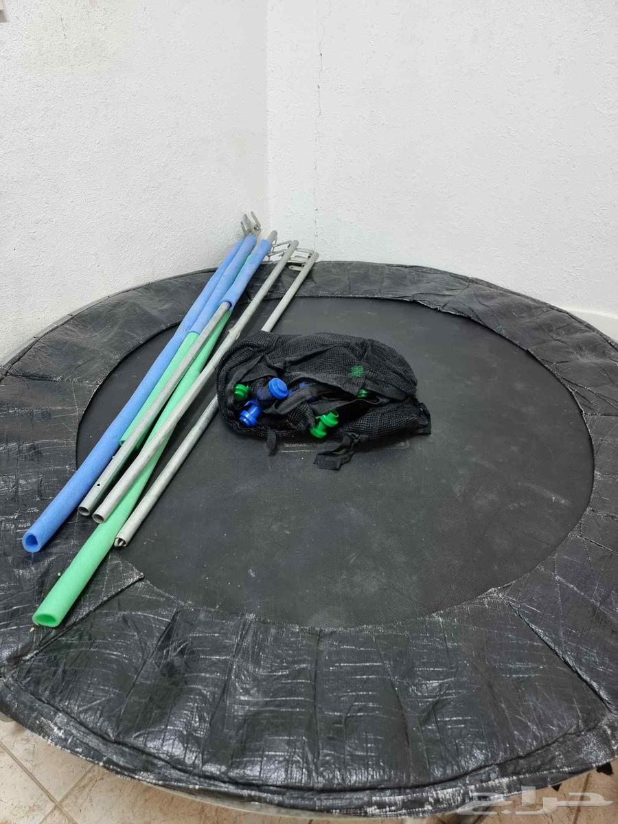 Lego robot, scooter, and trampoline.63418368027521113