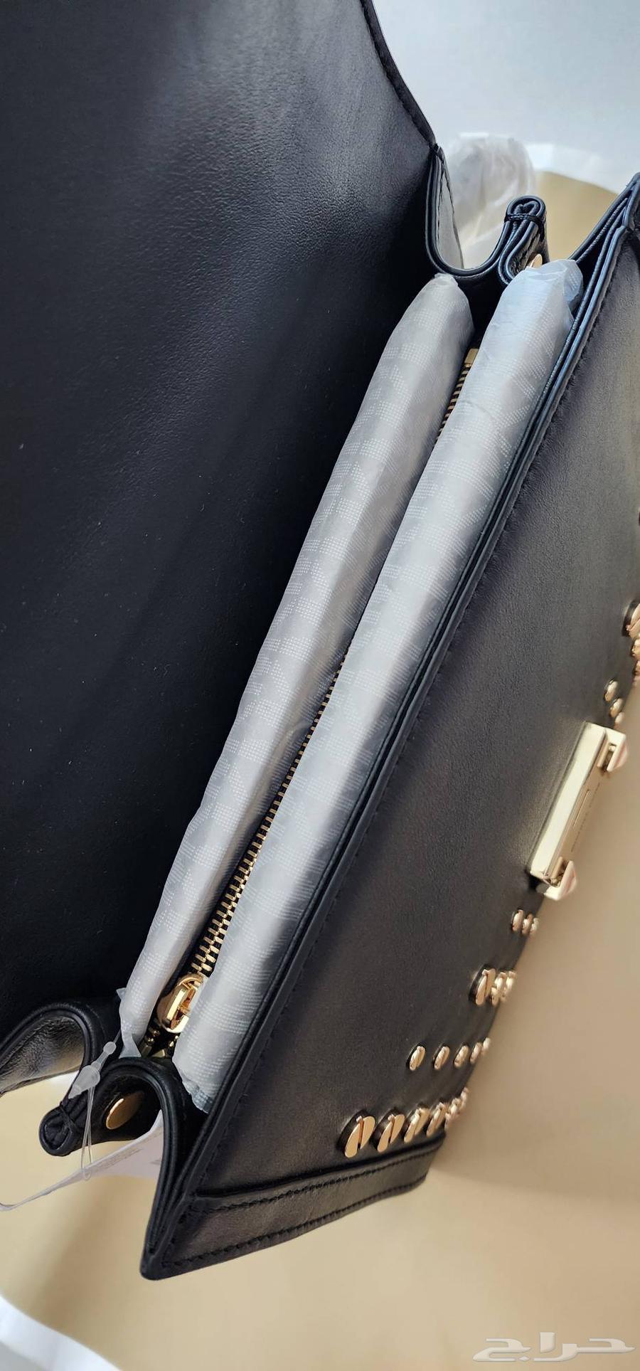 حقيبة Michael Kors جلد أسود مع معدن ذهبي  أصلية من أمريكا63416379097347113