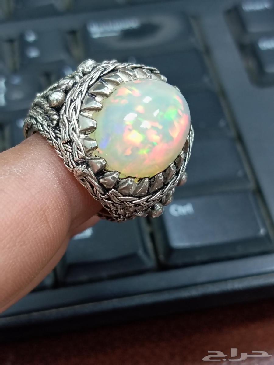 Ethiopian white opal ring with full fire in a unique wire setting63405563508225111