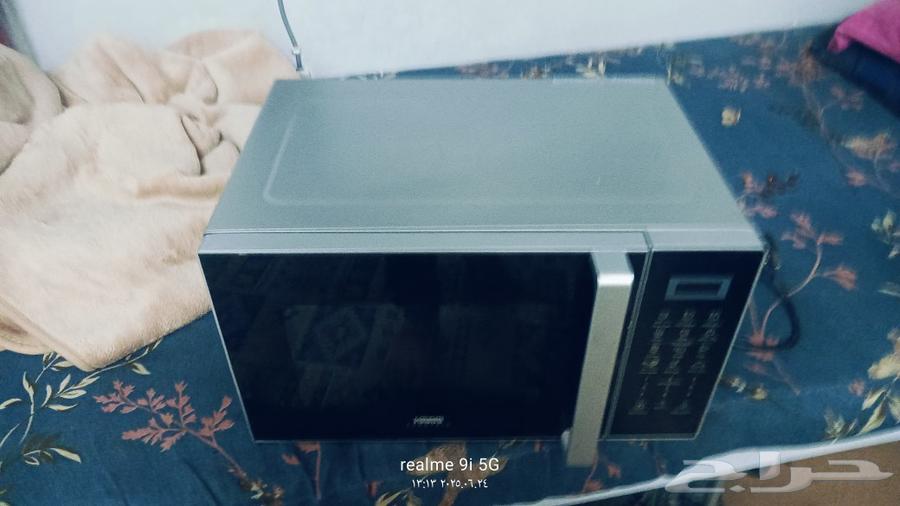 ميكرويف هام ومكنسه كهربائي633795291797771111