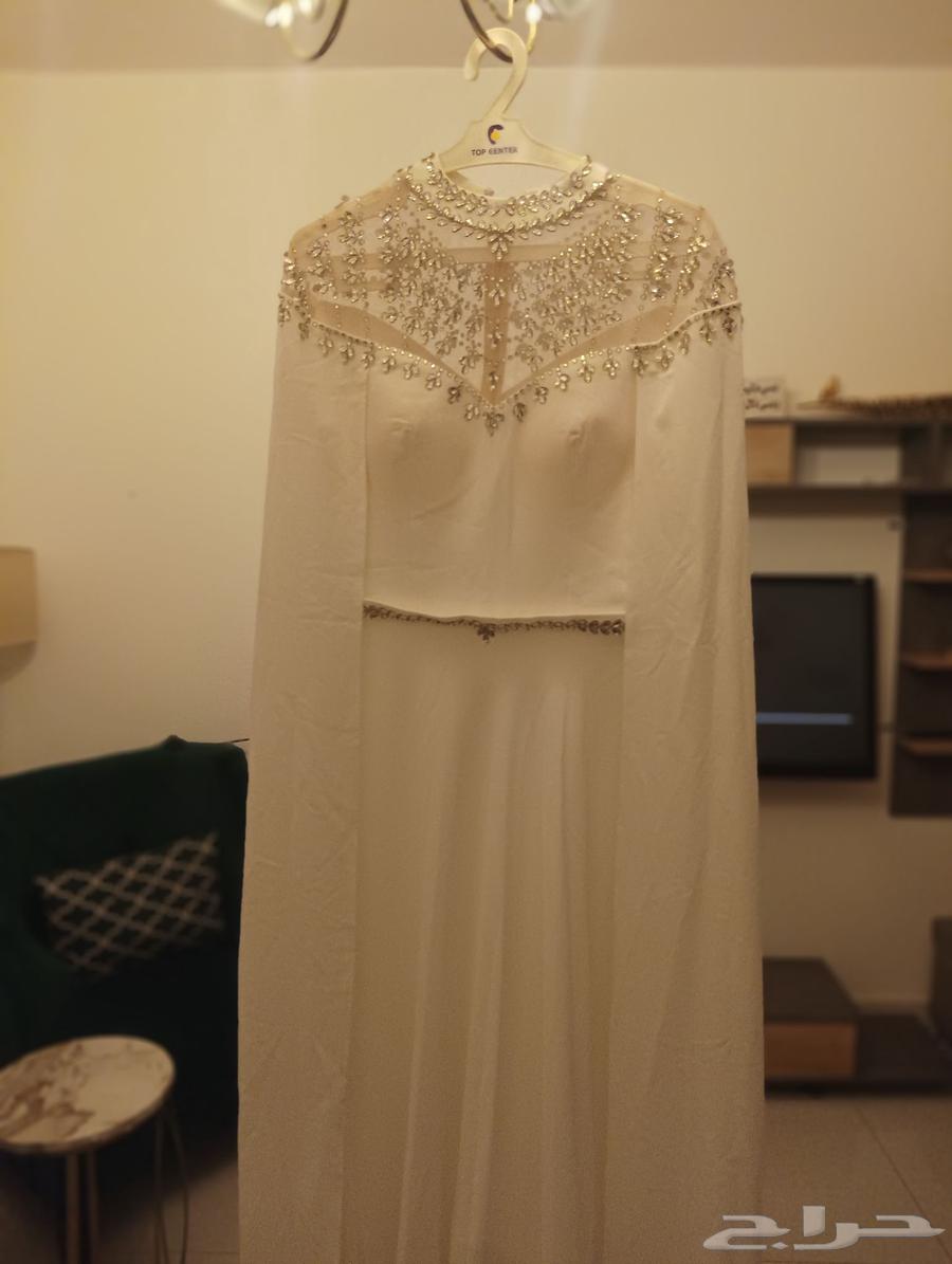 A new white dress for sale, never worn63398337622785111