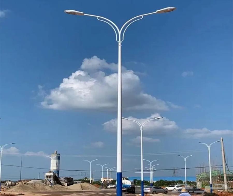 Installation of lighting columns and interlock around the parking lot630292385470731119