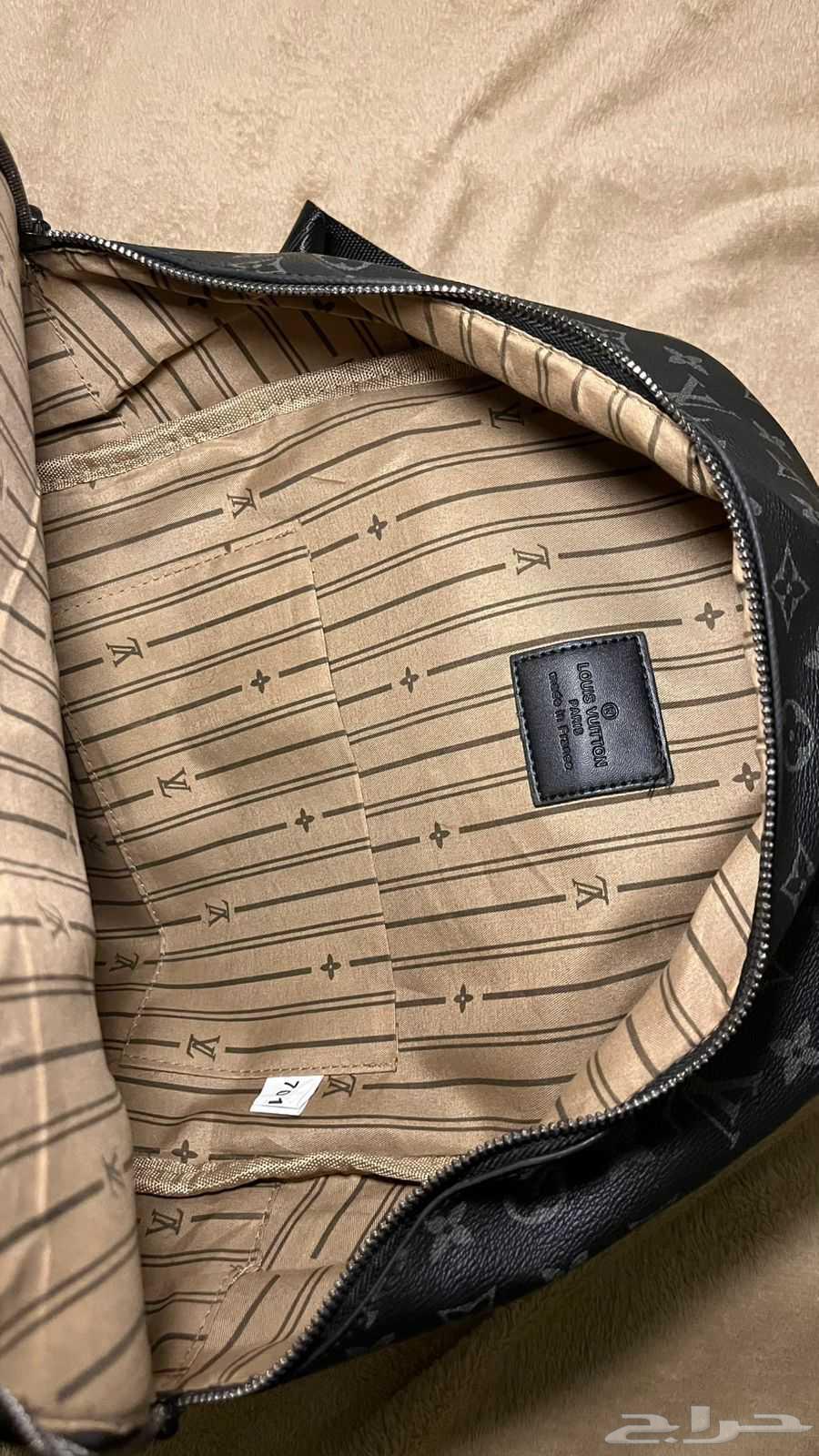 L. V. Bag63618874823043112