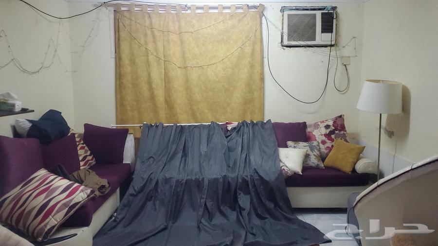 Stair and sofa and table and screen63667521763202112