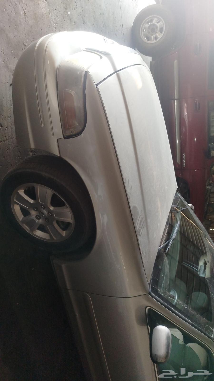 فورد فكتوريا 2006 لون فضي فيبر شمعات كبوت رفارف63673538406786110
