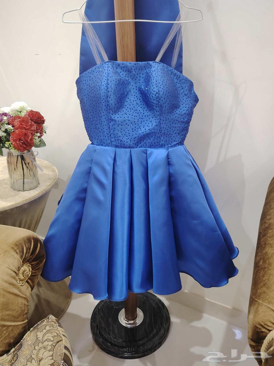 Navy blue dress with a large ribbon on the back, never worn63656213379457113