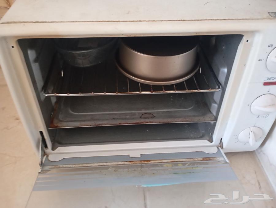 فرن كهربائي في حالة عمل63655711044097111