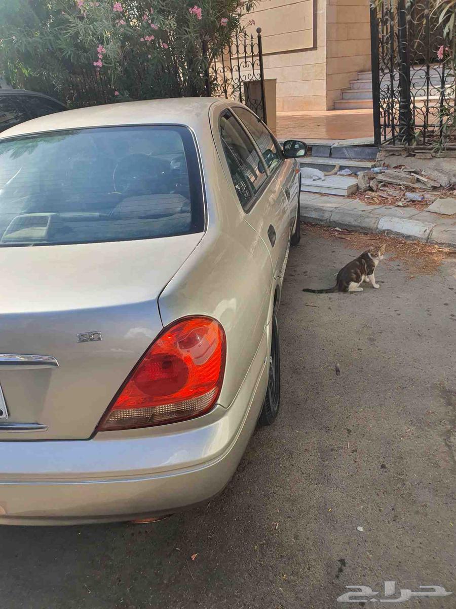 سيارة نيسان صنى 2004 مانيول الماكينه ممتازة مع رقم مميز جدا63700621993987110