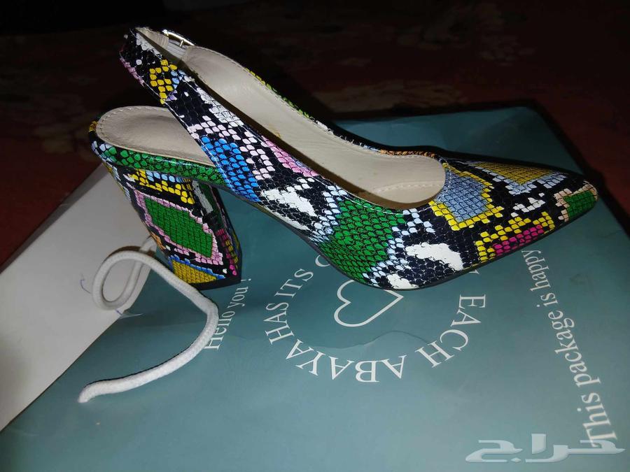 Unworn snake leather shoes with their belt63670089329666110