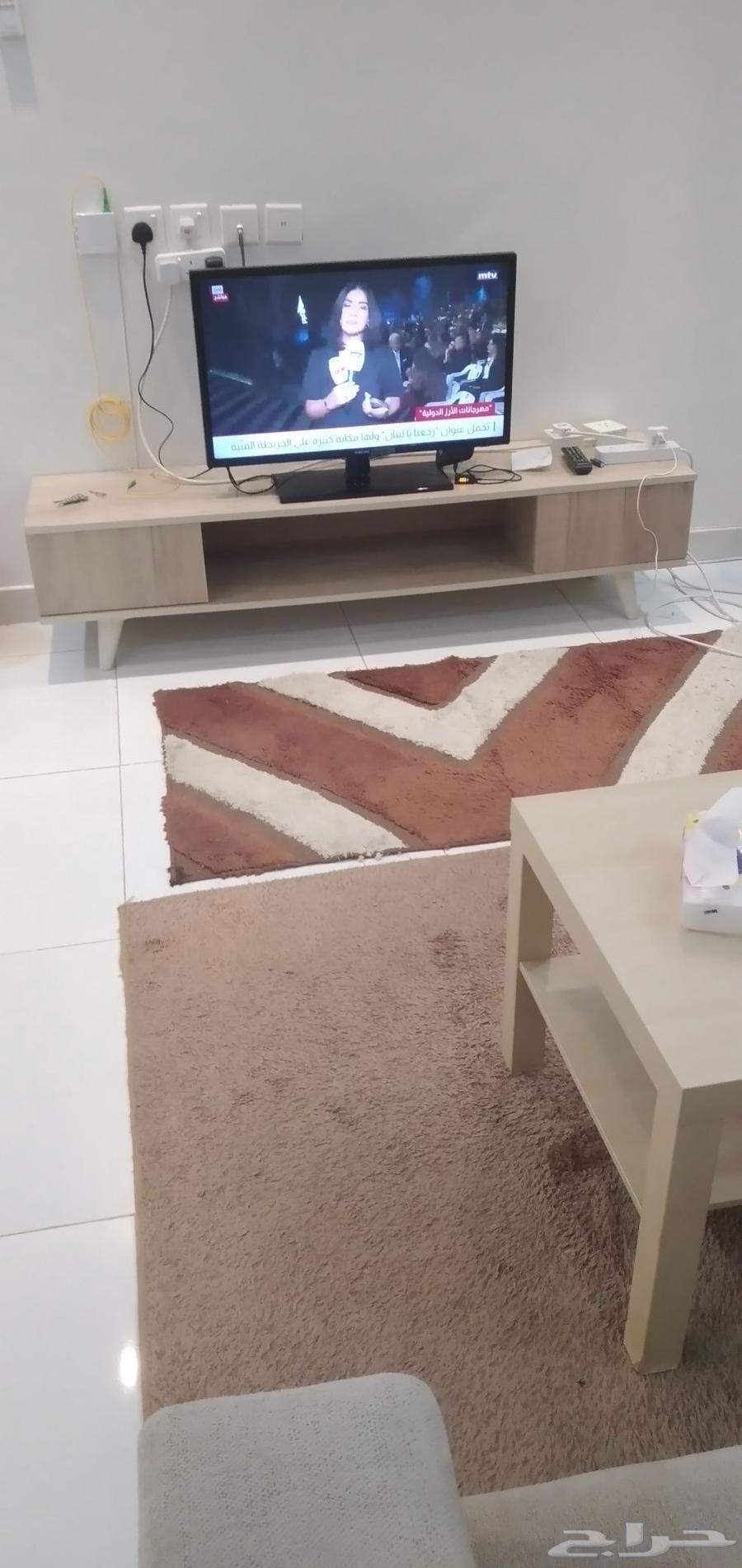 Sofa with TV table, regular table, curtain, 3 rugs, mirrors, and shelf63699007653123114