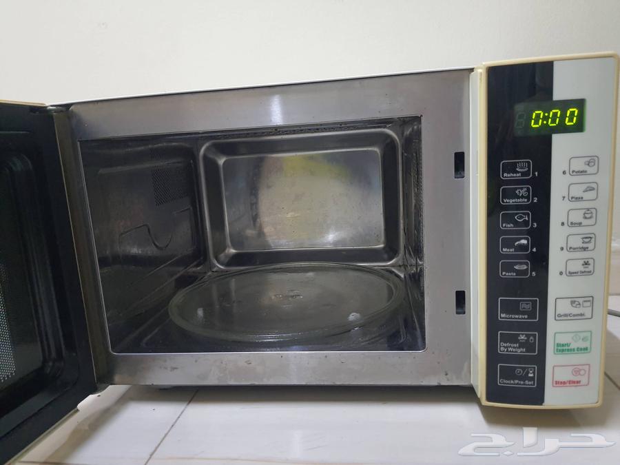 Knood microwave with grill, 35 liters, semi-new for sale in Dammam63701610021123111