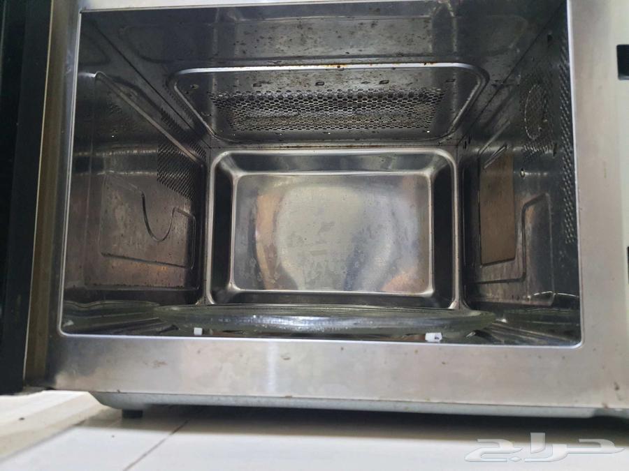 Knood microwave with grill, 35 liters, semi-new for sale in Dammam63701610021123114
