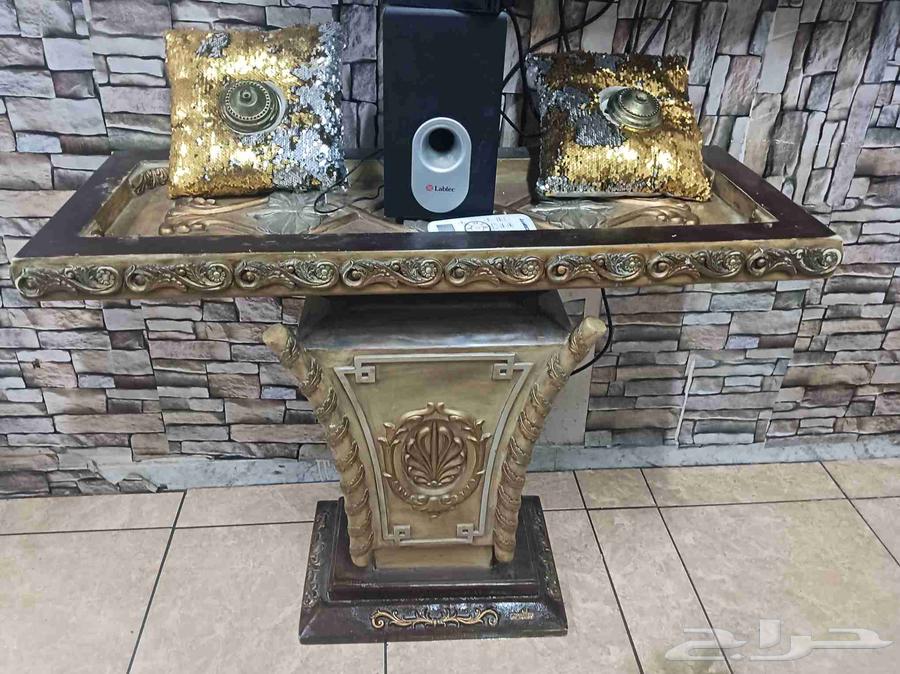 Entrance table and two cabinets, and a walking cane and two coffee tables63704835771265110
