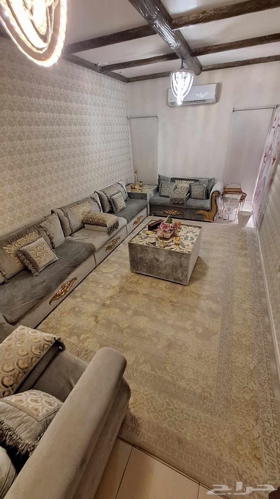 Sofa, curtains, carpet, and three tables63725997319042111
