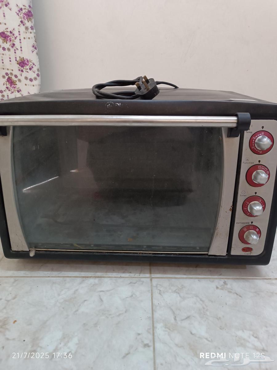 فرن كهربا حجم كبير كهربا 210 شغال يحمى بسرعة بس ينقصه رف شبك63721036561410110