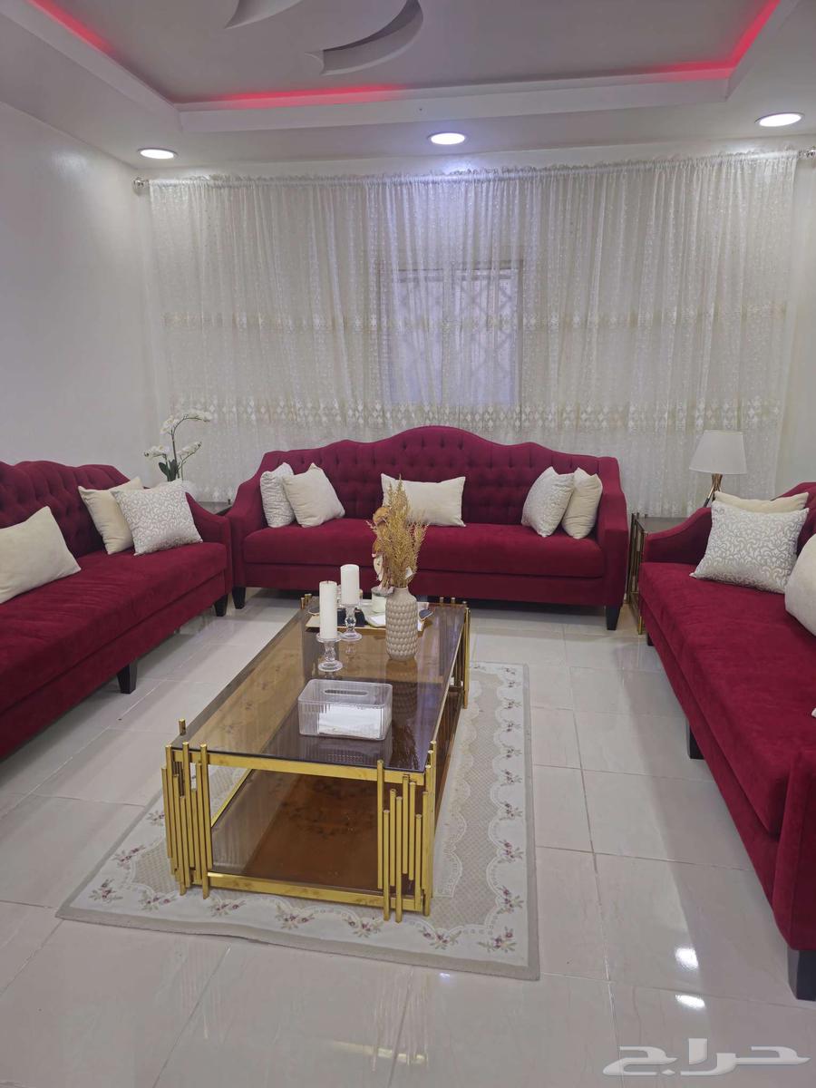 Clean sofa with tables, curtain, and mat in Jeddah63725251781762110