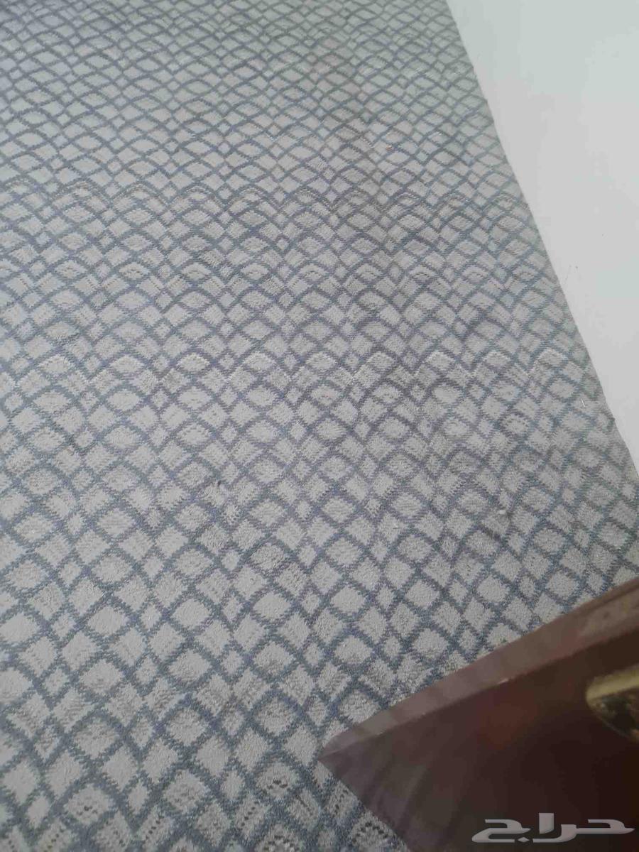 Table with chairs. 6 An-Nahal water bottles. Two sofas. Nearly new carpet63731065965825112