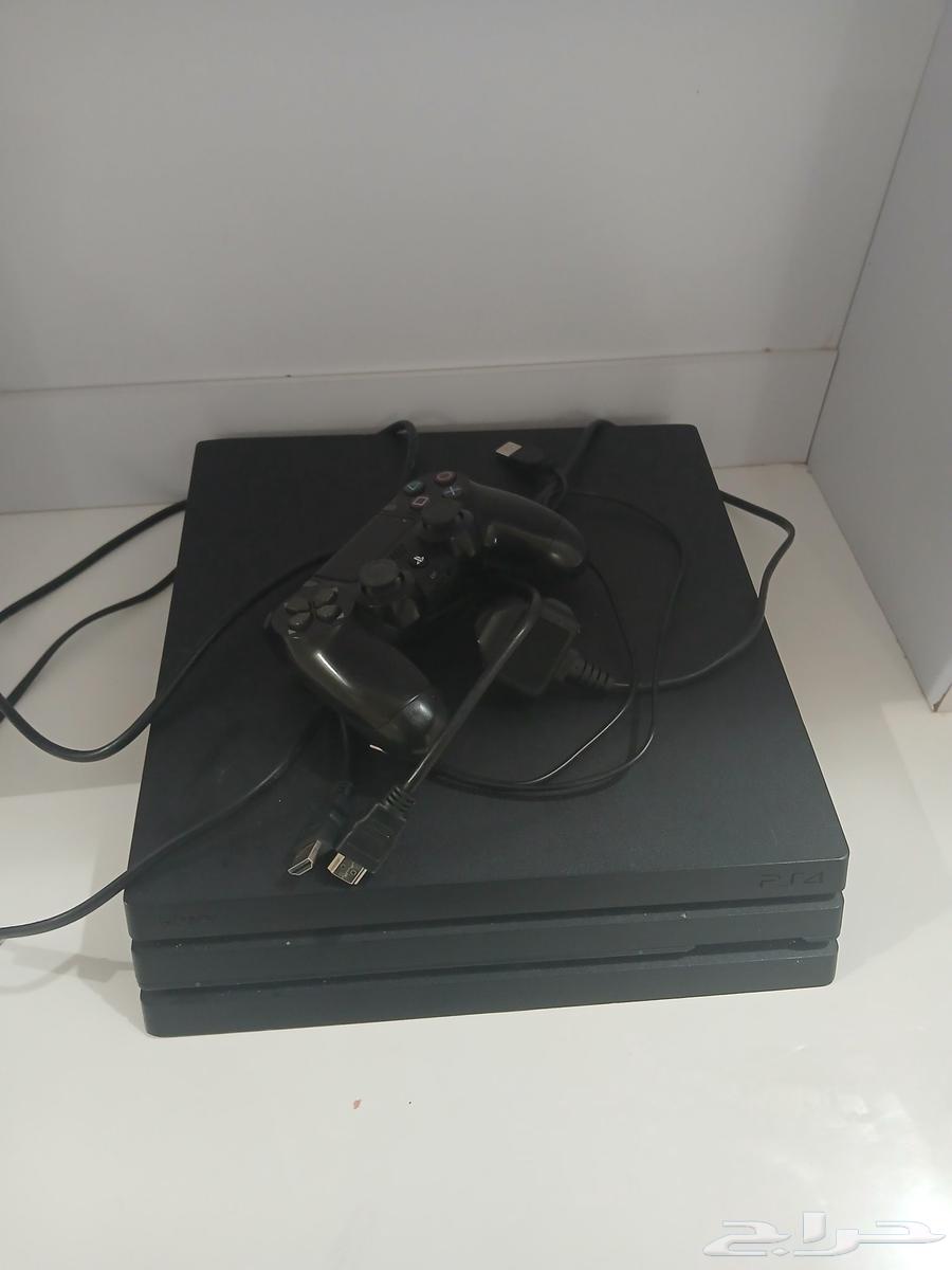 PlayStation 4 Pro with original controller, cables, and four games63740185931905110