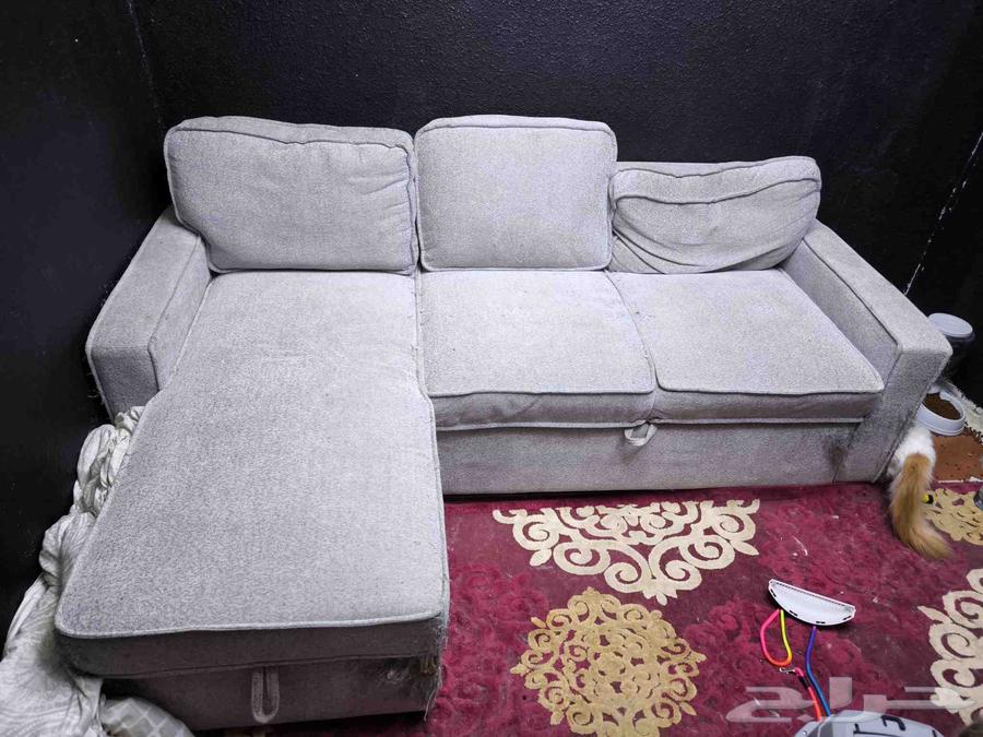 Corner sofa that turns into a bed and has storage space63747332927747110