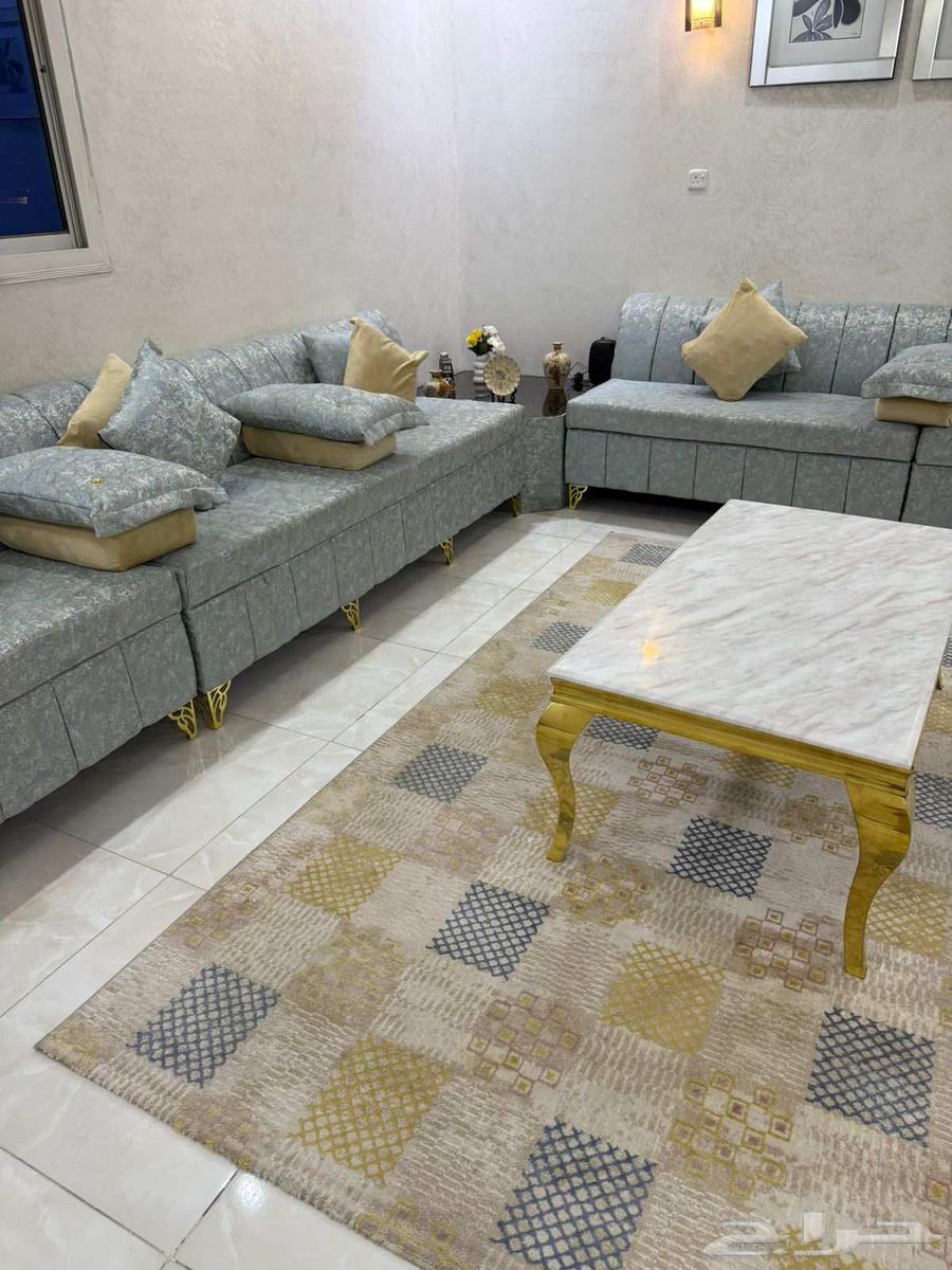 Almost new sofa set with no damage, includes table, mat, and curtain63761804721795111