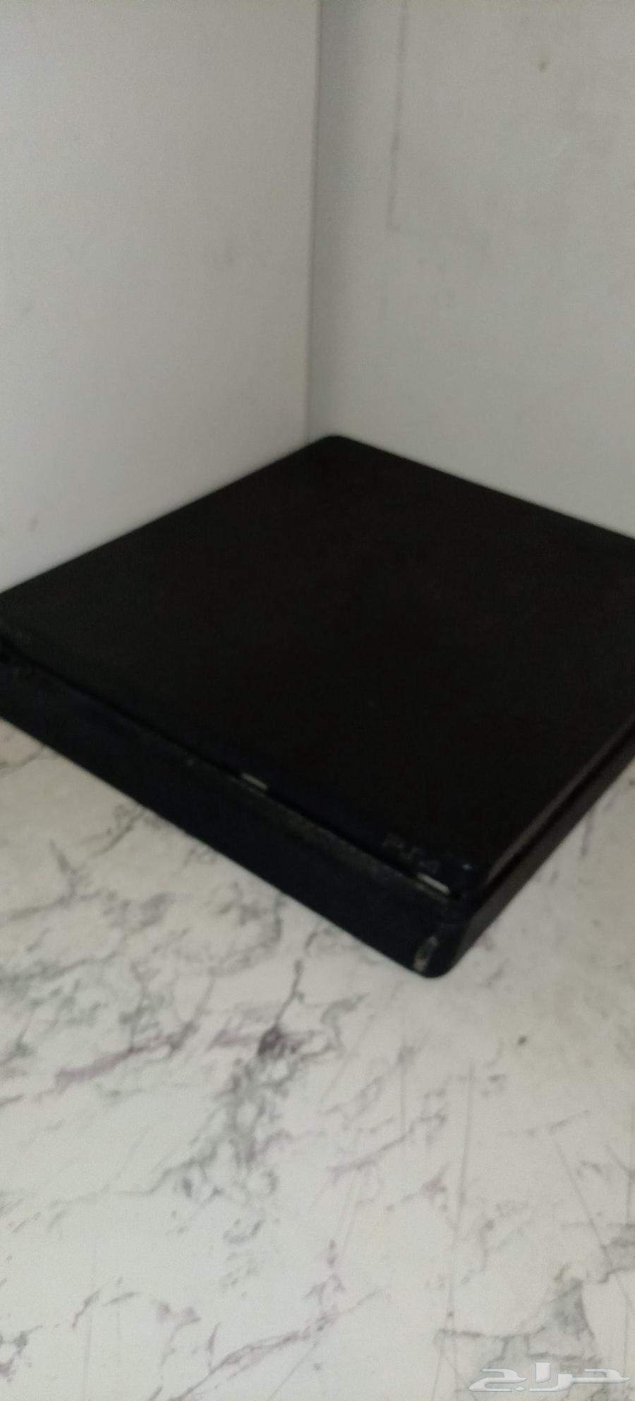 Sony 4 with original controller and Grand Theft Auto and Hitman game discs63768227279875110
