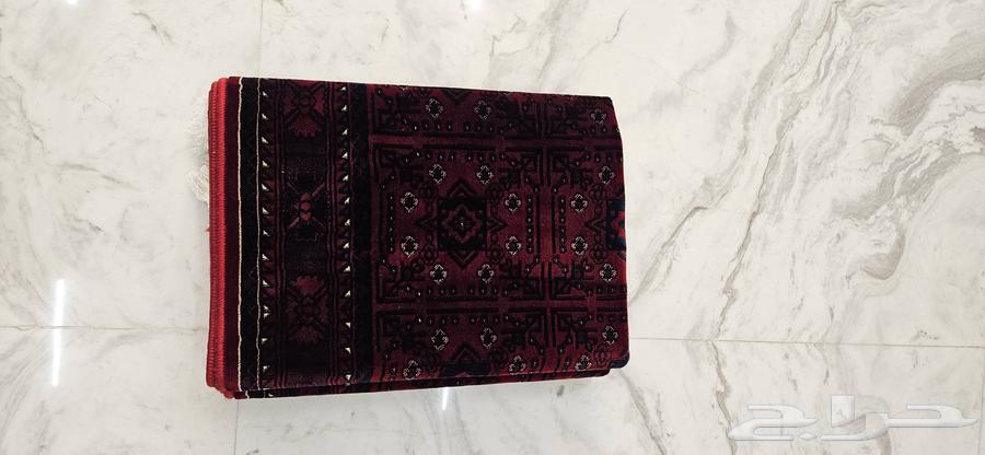 Luxurious durable red mat measuring one meter by two meters63780771320577111