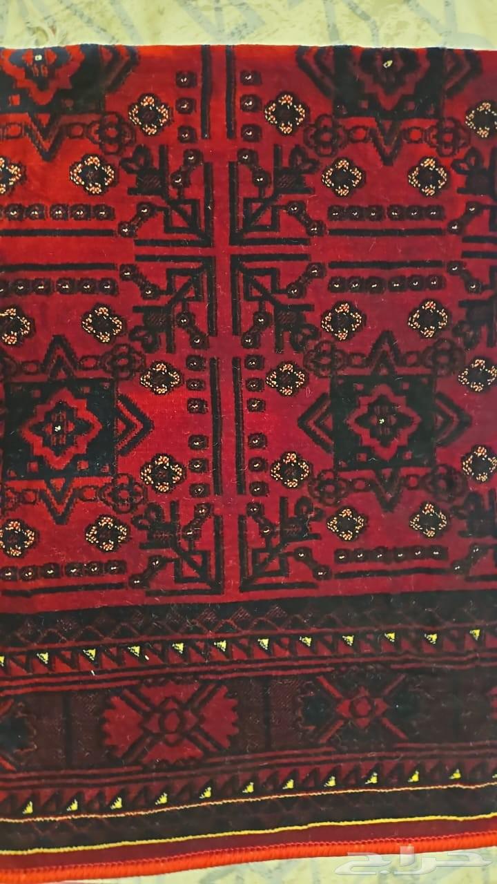 Luxurious durable red mat measuring one meter by two meters63780771320577112