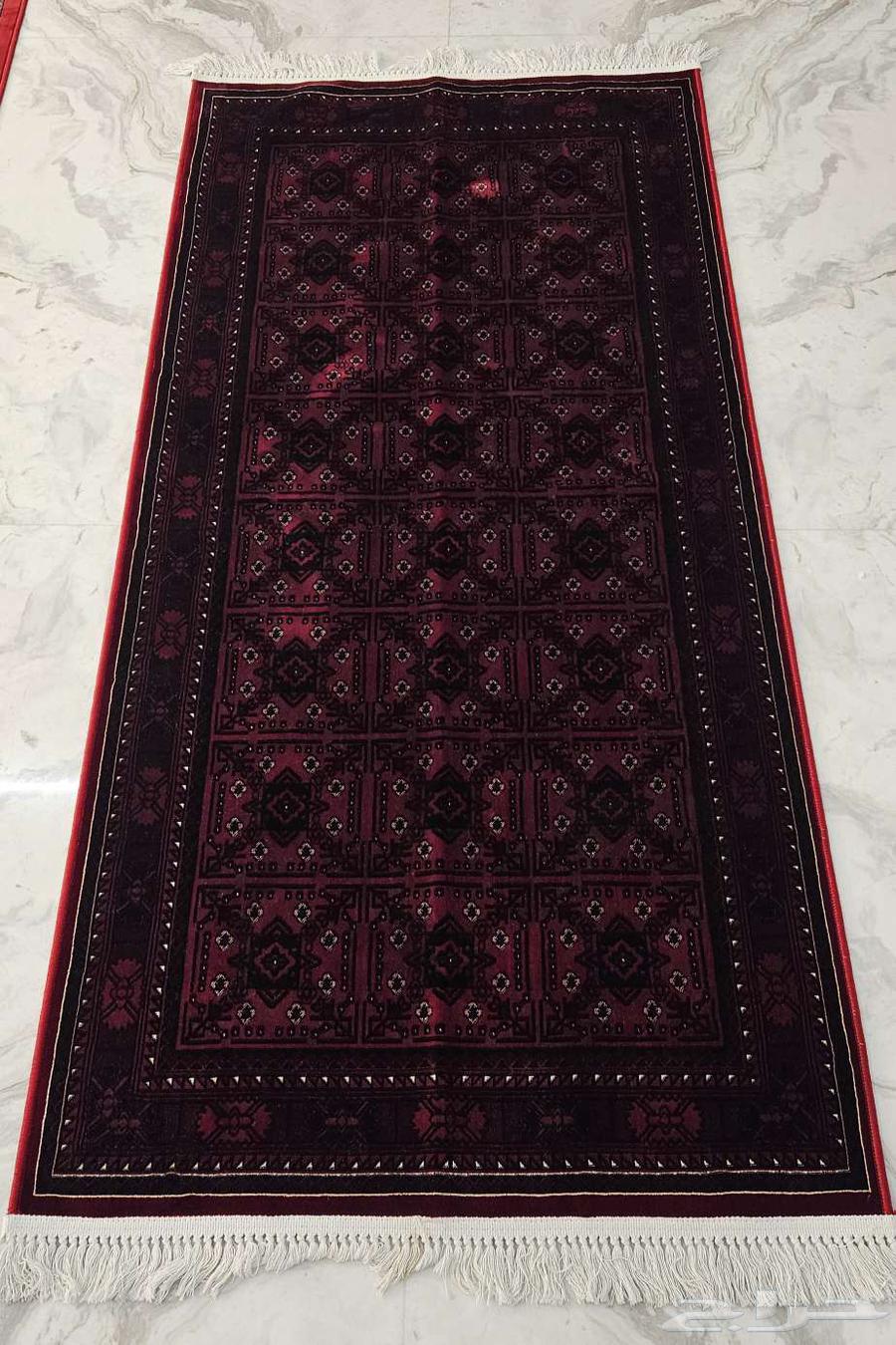 Luxurious durable red mat measuring one meter by two meters63780771320577110