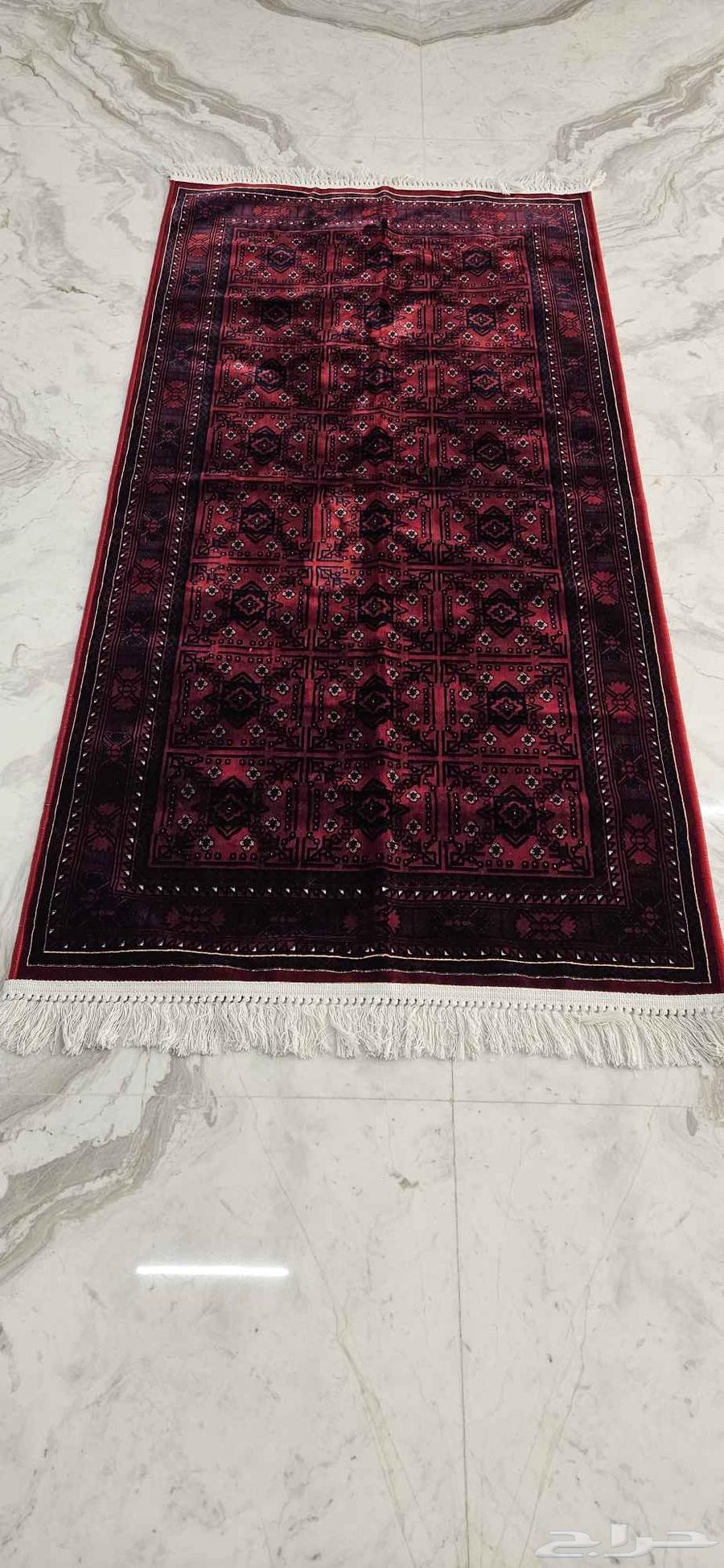 Luxurious durable red mat measuring one meter by two meters63780771320577113