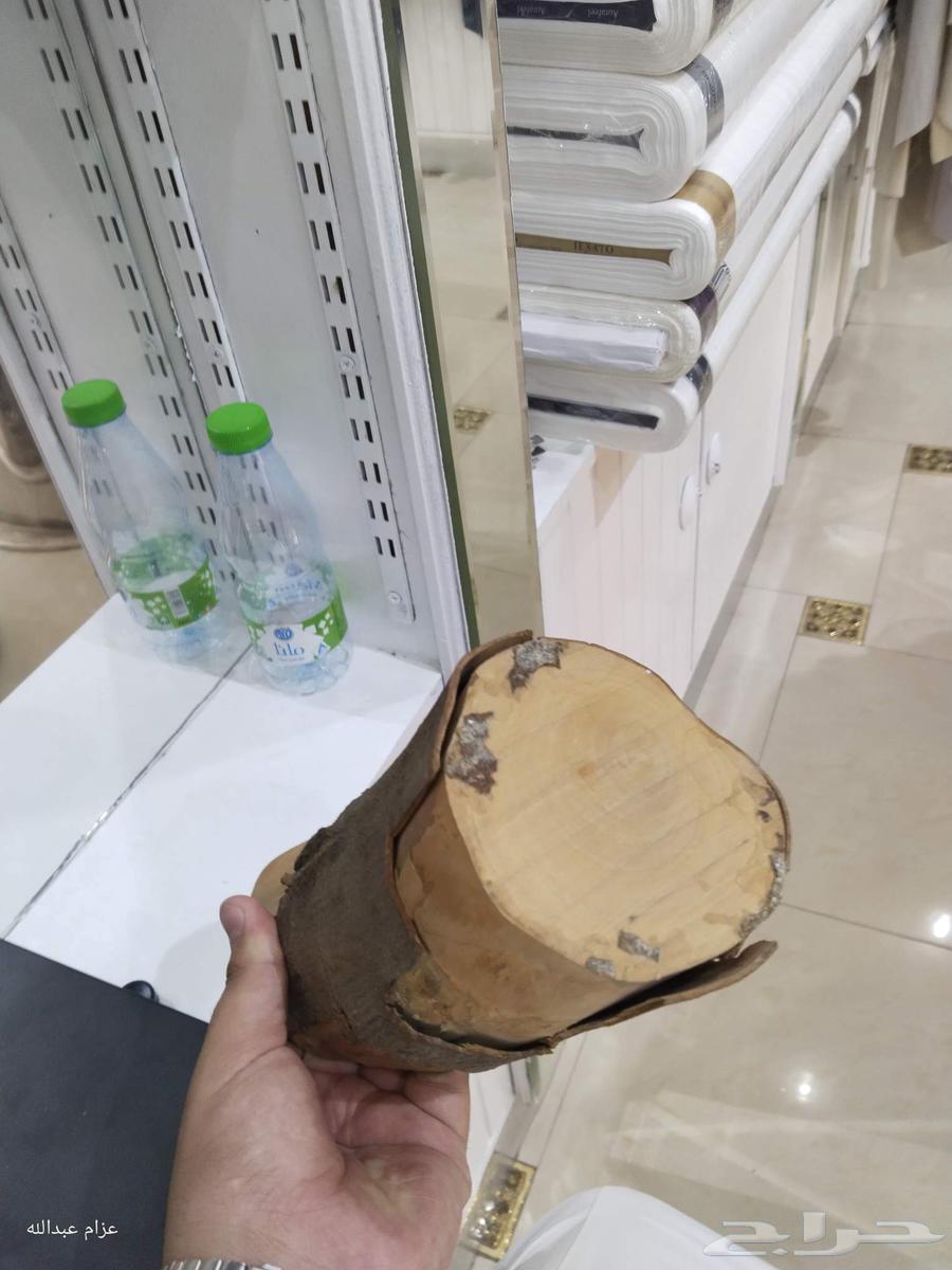 خشبة قديمة مكتوب عليها قرآن عمرها 25 سنة63797075447427111