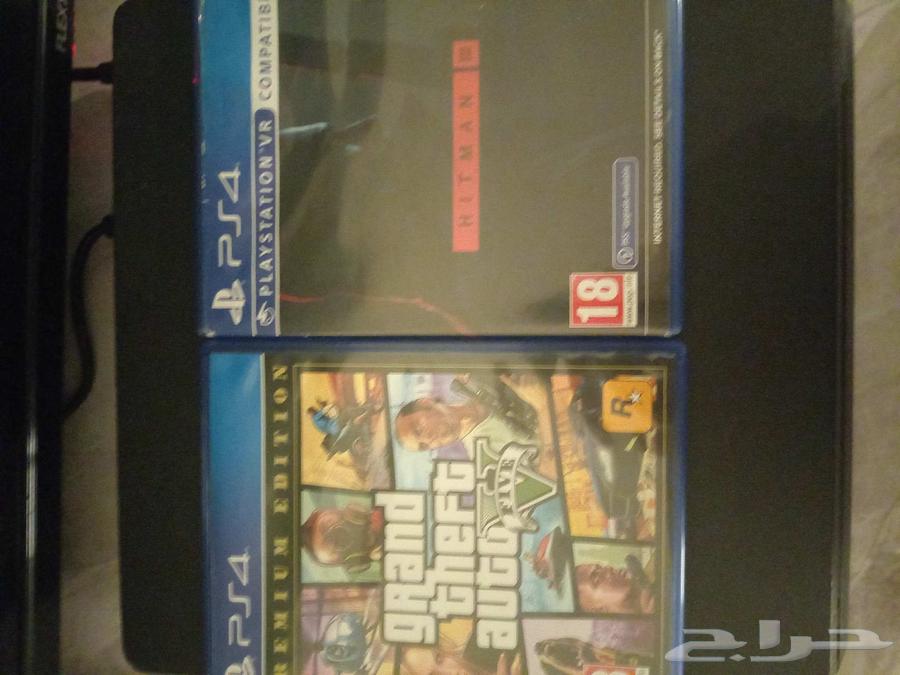Sony 4 with original controller and Grand Theft Auto and Hitman game discs63768227279875112