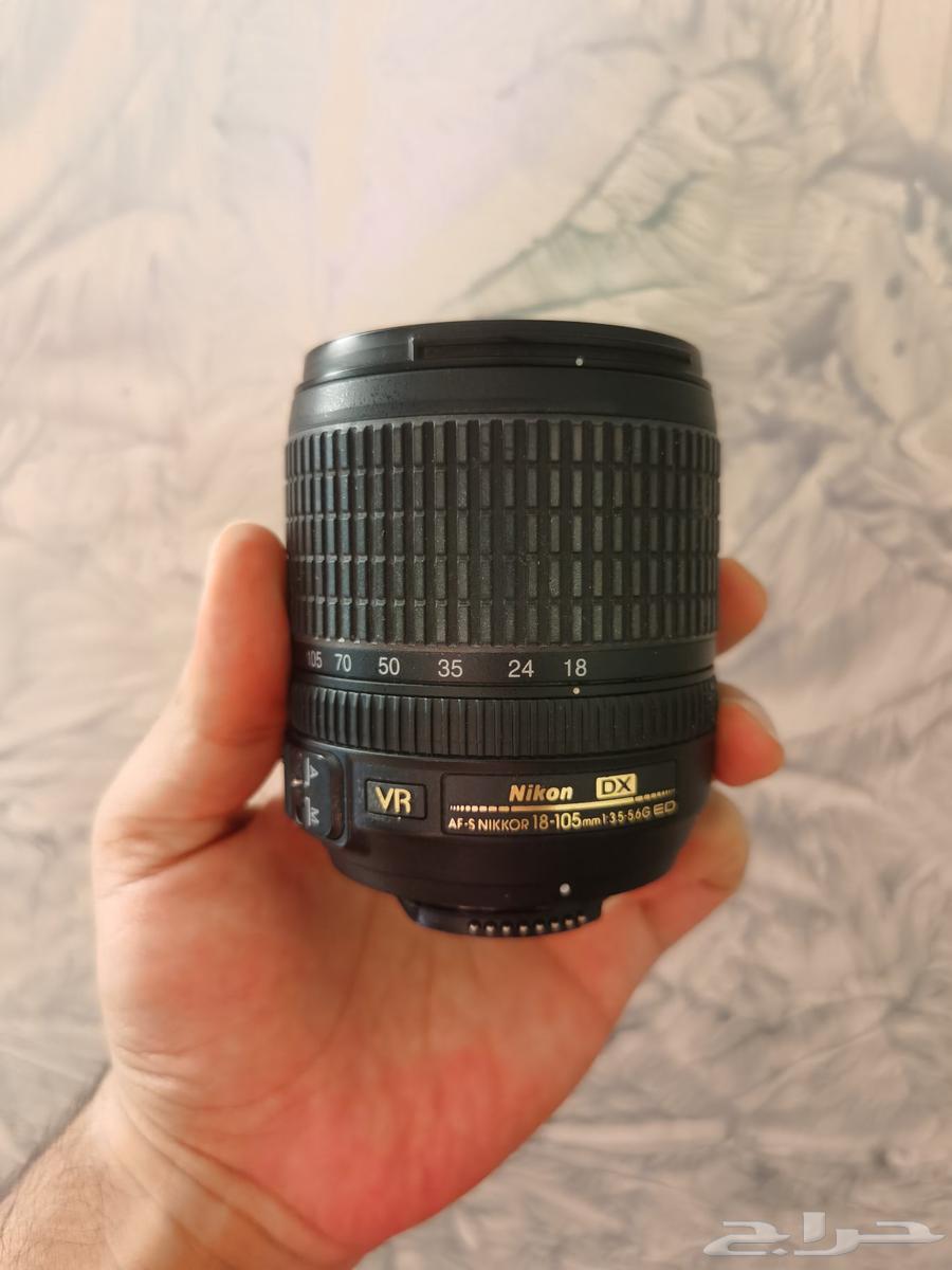 Nikon lens, mouse, and Huawei bag63390709919747119