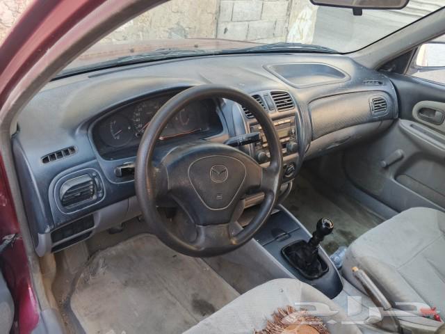سياره ماذدا 323موديل 2001مجدد مفحوص63396455426305112