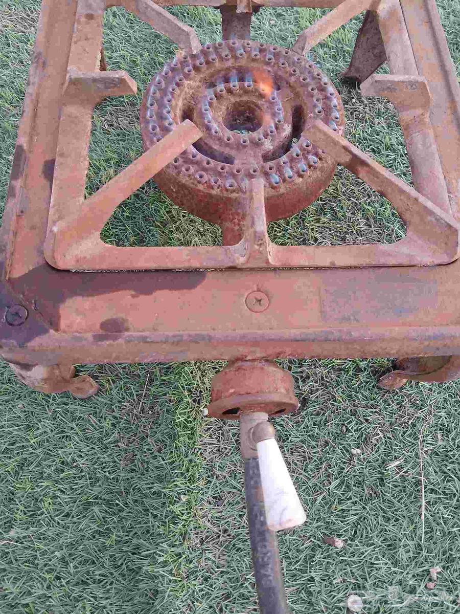 Old used gas stove or heater63618492536450113