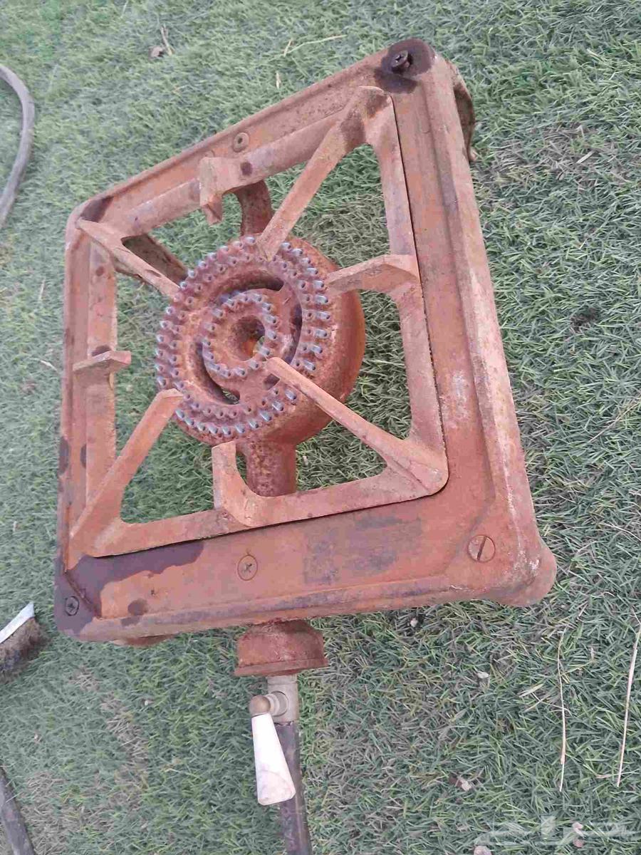 Old used gas stove or heater63618492536450114