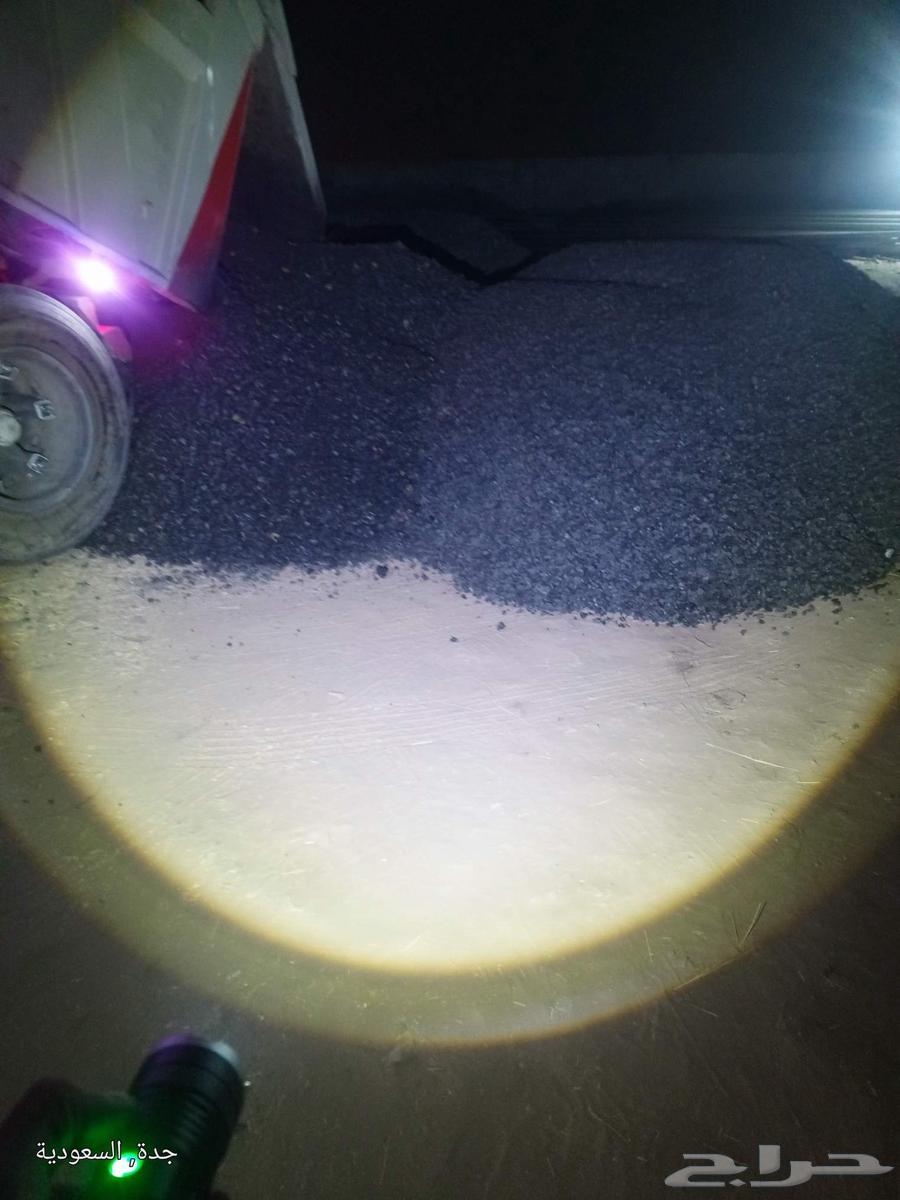 Clean chipped asphalt from under the scraper64360319587201110