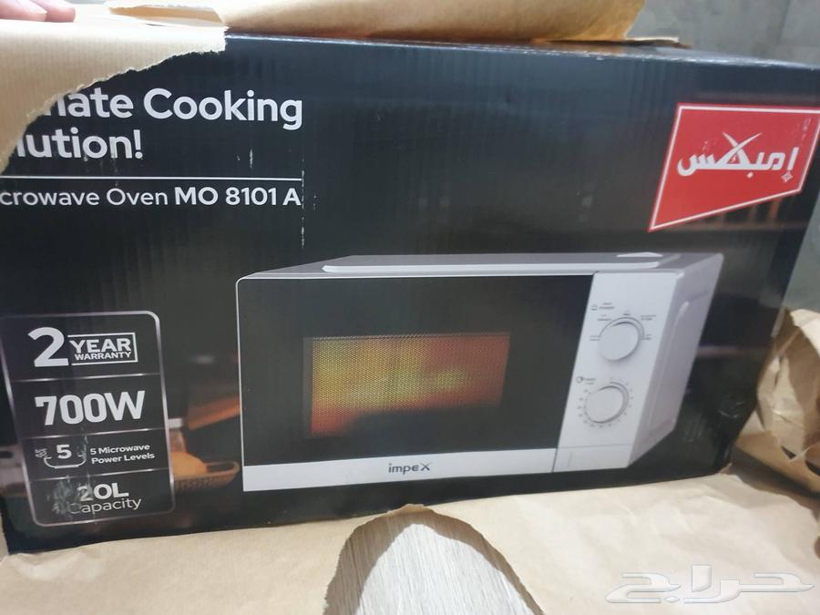 New Embx microwave with carton, never used64141535900163110